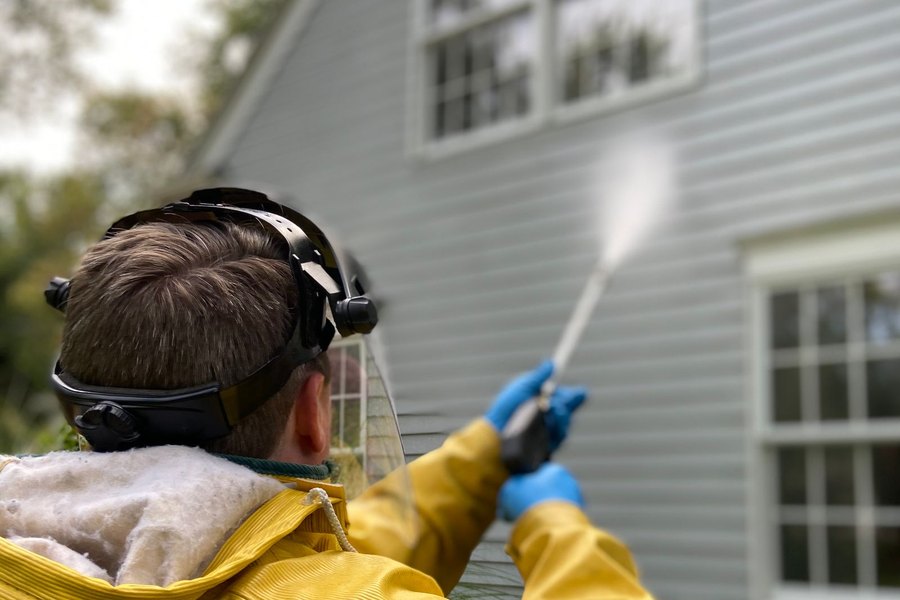 Water rinsing down an asphalt-shingle roof